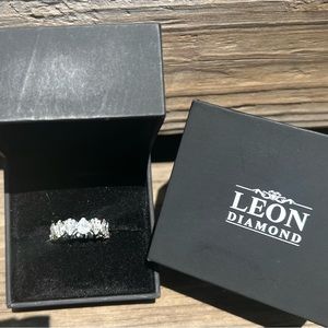 New Never worn 14kt White Gold and Diamond Ring